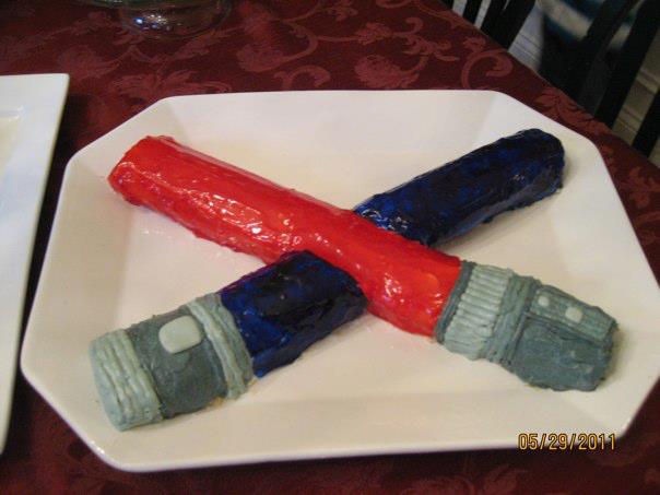 KFerrigan's tweet photo. Good vs evil for these #StarWars lightsaber cakes #DisneySummerContest http://t.co/Oije6GLynW