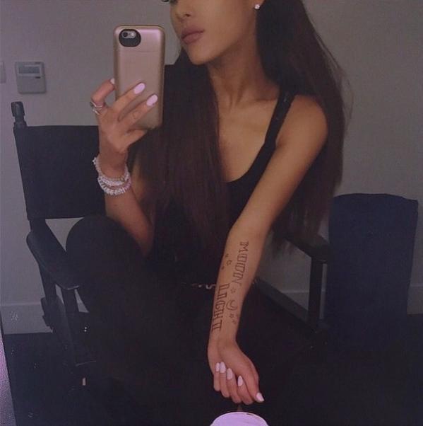 Ariana took a selfie with the words moonLight on her Arm!