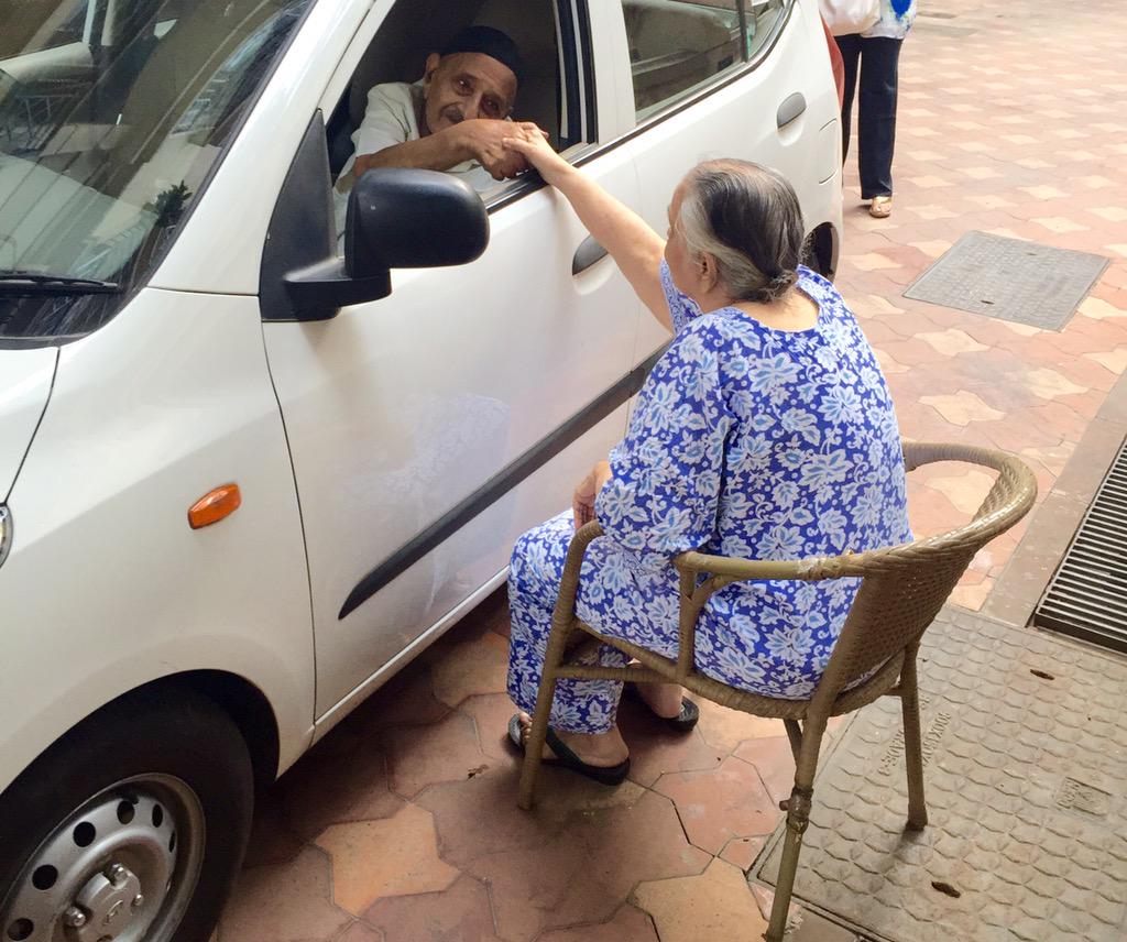 bomanirani's tweet photo. Mom saying goodbye to her 90 year old brother Tehmtan from Pune. He can't come up, She can't stand up much. http://t.co/rraAz1EIwi