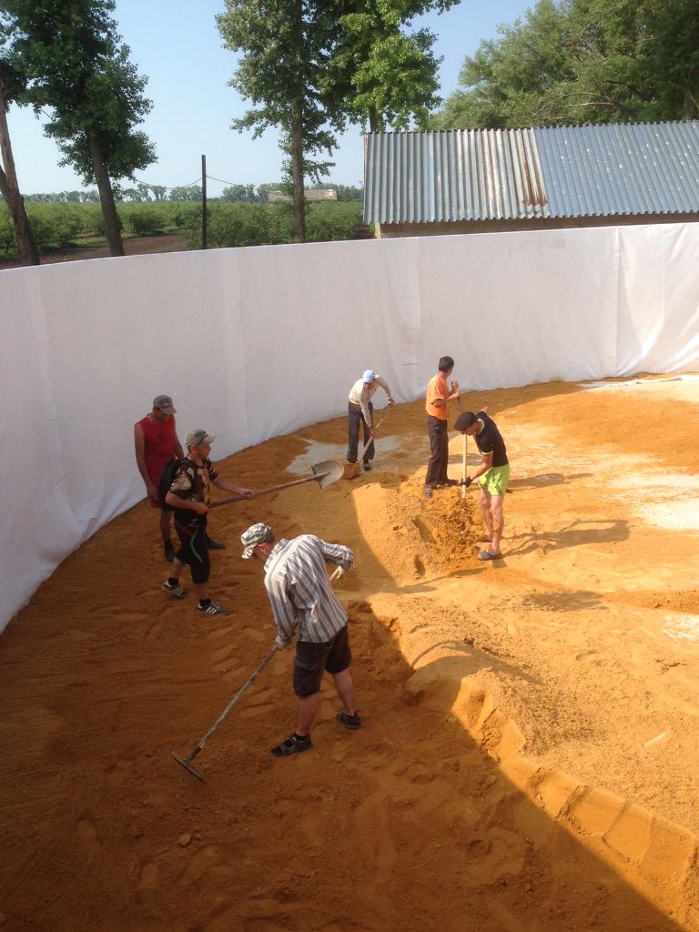Day 5 in Russia : lots of sand to be spread ready for fleece and liner.