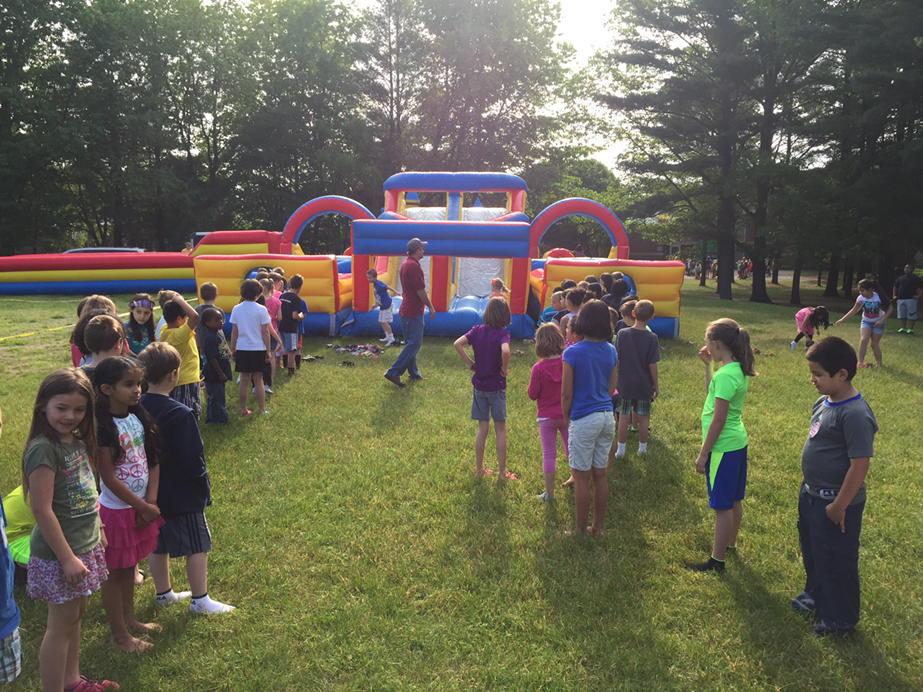 2nd graders waiting patiently for the obstacle course.