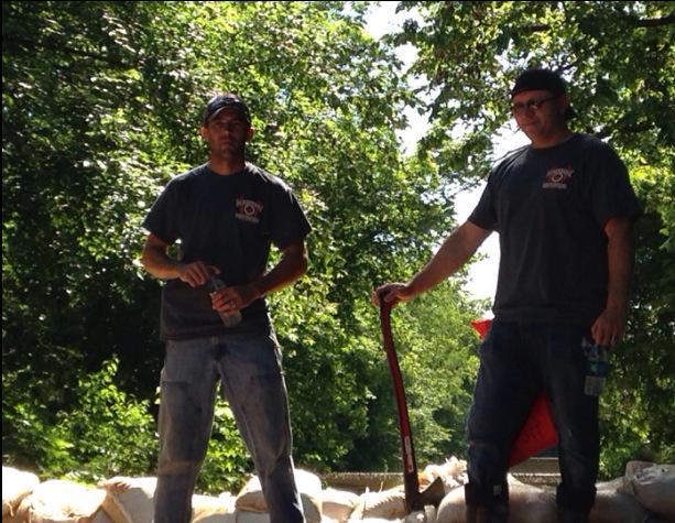 LachowskyClint's tweet image. IAFF Local 367 members volunteering for the flood efforts.