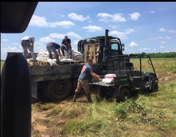 LachowskyClint's tweet image. IAFF Local 367 members volunteering for the flood efforts.