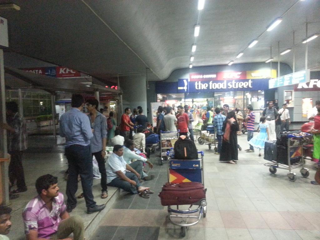 palwai's tweet photo. A section of the crowd struck at #RGIAirport due to shortage of cabs!
@MeruCabs #SkyCabs @OlaCabs http://t.co/LbhRYZdD0p