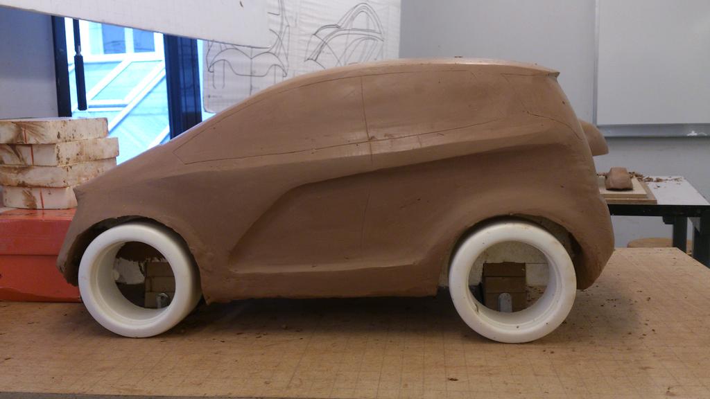 Adam_ElChaar's tweet photo. Micro muscle car project for Ford inspired by Iron Man #car #design #model #clay #student #internship #ford http://t.co/MblX7wav7u