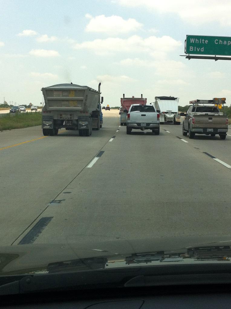Diwilson18's tweet photo. 3 rock haulers across 114. Think a windshield repair company planned this? #soslow #windshieldstars http://t.co/EJpv8eg8JF