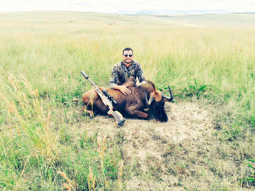 nv786zn's tweet photo. First black wildebeest @Sniper_Africa @safricahunting .308 160 m http://t.co/k7f0d7uFyd