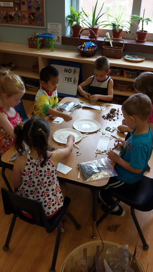 AlainaStandring's tweet image. Hard at work creating #naturenames today. Items collected yesterday during #outdoorlearning are being used.