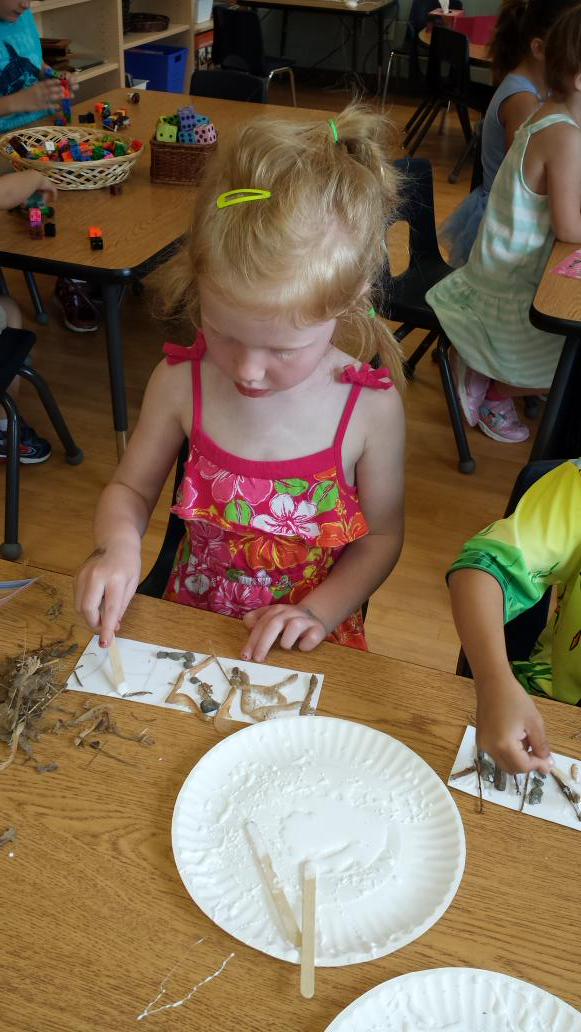 AlainaStandring's tweet image. Hard at work creating #naturenames today. Items collected yesterday during #outdoorlearning are being used.