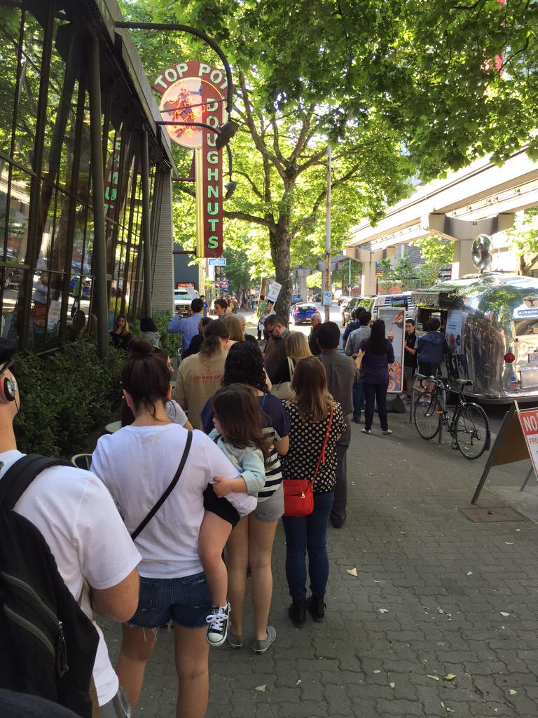 DCDonutCrawl's tweet photo. Long line at @Toppot. They even brought out the #airstream! Happy #NationalDonutDay from Seattle. http://t.co/FUI3JdyT8C
