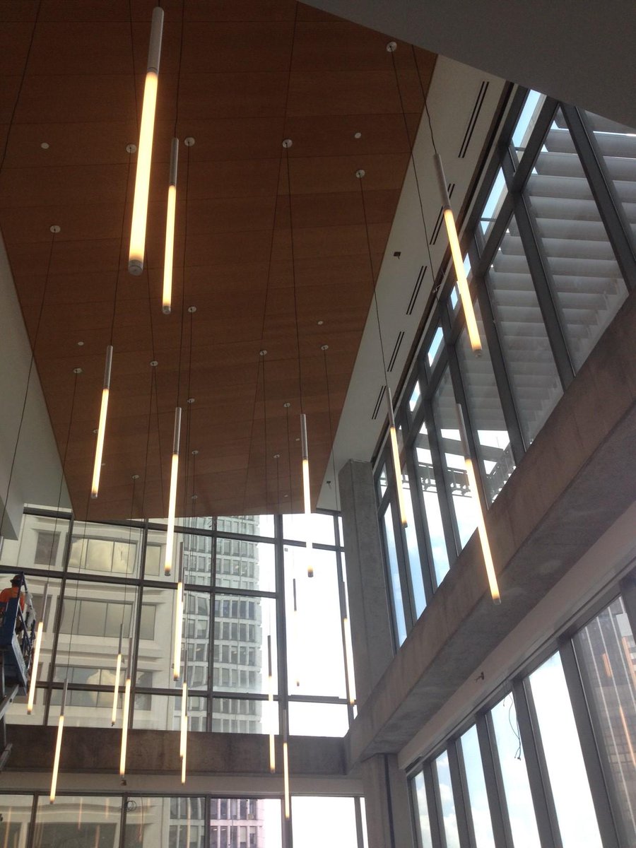 gsulawconstruct's tweet photo. Hanging lights in the new College of Law library atrium! @GeorgiaStateLaw http://t.co/MLHWksgVWA