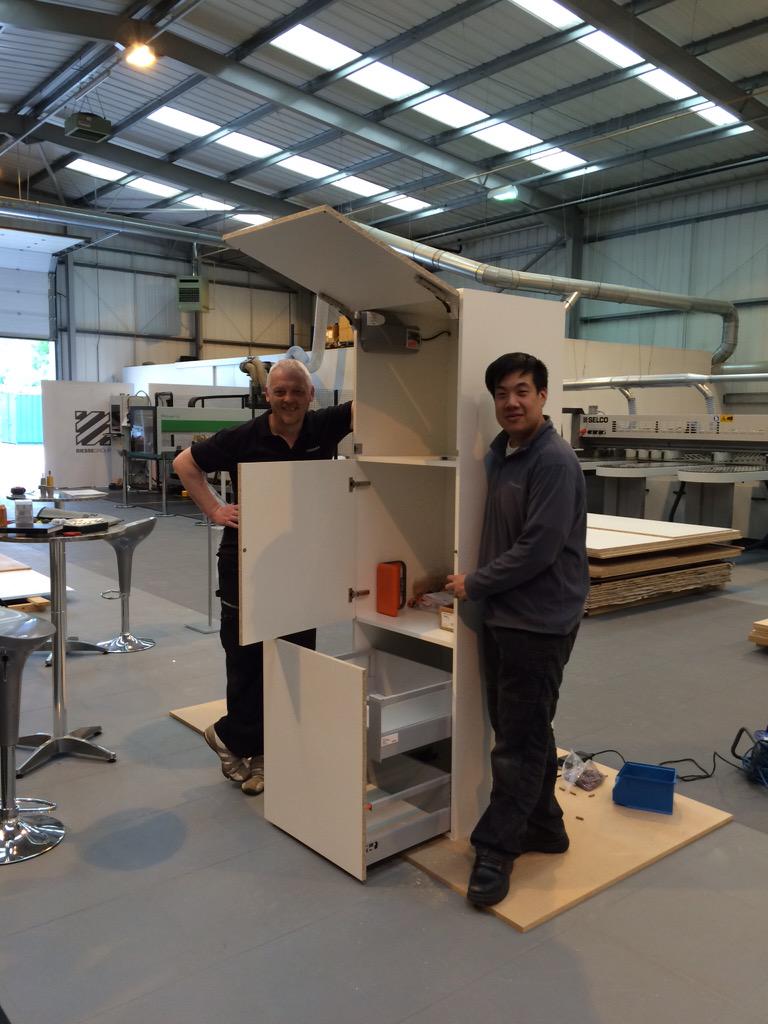 chris_ebbage's tweet photo. Nige and Jon from Blum in the Tech Centre building a cab with servo openers. Cool or what? @BiesseGroupUK @blumuk http://t.co/QhHv8QU833