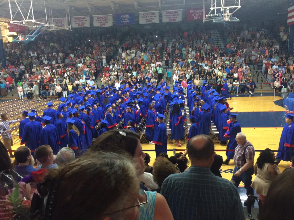 caroltheginger's tweet photo. Someone went to the wrong seat and they're all confused now #khsgraduation http://t.co/C84Xt522sS