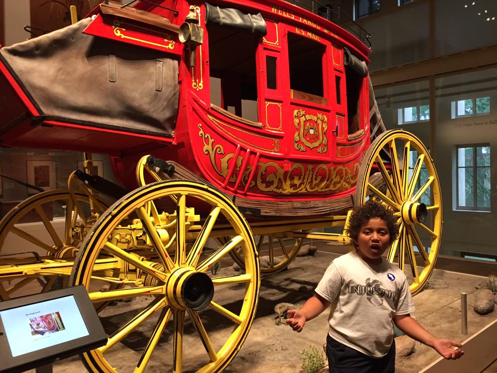 My lil bro doing the get money dance in front of the Wells Fargo Stagecoach. We outchea. #BriscoeWesternArtMuseum