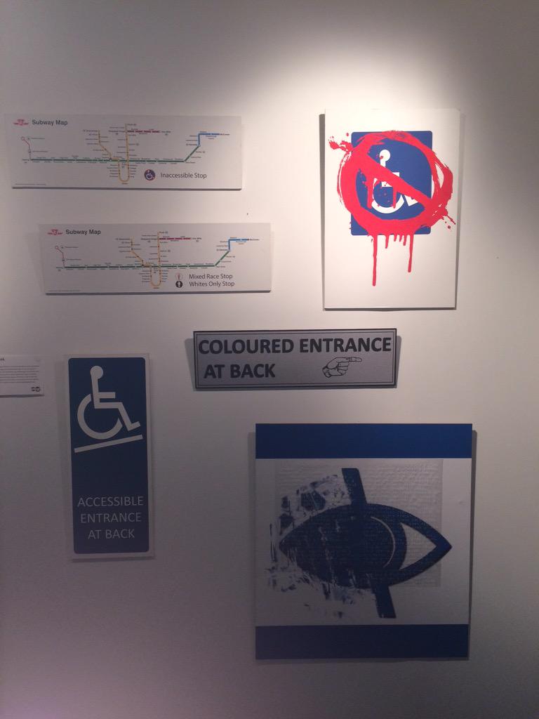 SKETCHToronto's tweet photo. Candice Leigha's "Human Heirarchy", mix of prints and Braille on Masonite using modern and vintage signs #AShow2015 http://t.co/NOwvjNw7cZ