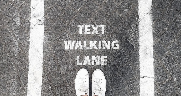 TesaPern's tweet photo. Love this idea, 'Text Walking Lanes' in Antwerp! Should cause a lot less accidents...http://t.co/DErVGuOXbe http://t.co/QgholuFkyl