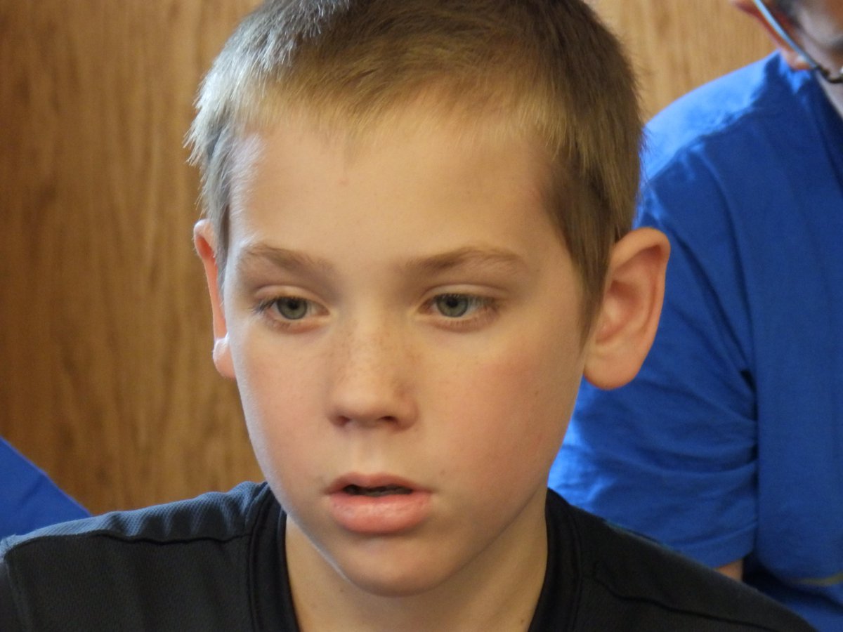 LibraryTechKate's tweet image. Summer Reading Participants pay close attention to Mr. Coventry as he explains "STOMP" and how to create a song.