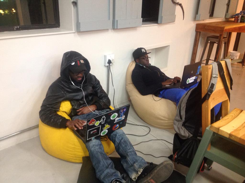TiyaniTee's tweet photo. Situation right now, @Hervinho_243 and @thevince23 plugged in on code @TheHookupDinner @SBIncubator #THUDHackathon http://t.co/ZsKb3cKLHX