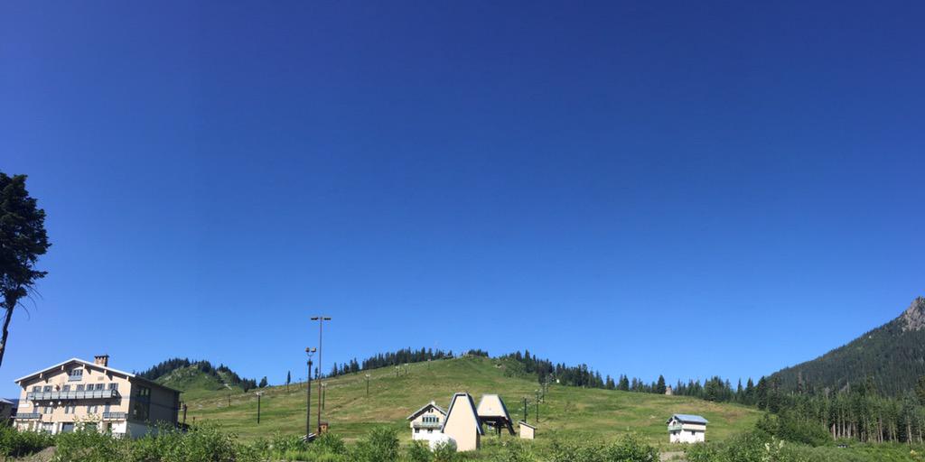 SeattleiteMag's tweet photo. So this is what @SnoqualmiePass #SummitCentral looks like without snow! http://t.co/gOJrqE1Lls
