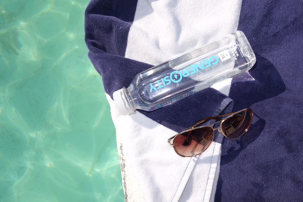Generosityau's tweet image. Poolside with #generositywater #alkaline #water helping to #changelives