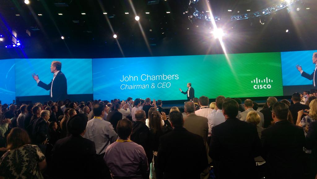 WHaskins's tweet photo. Standing ovation honoring the master, John Chambers, at his last #CLUS keynote. Very cool. #cscape15 http://t.co/H1FaH3ELPa