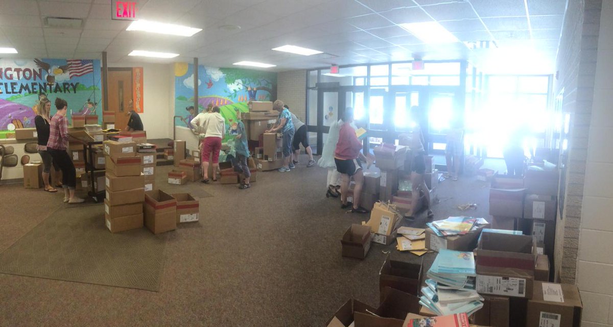 ArloElementary's tweet image. It's Christmas in June at  Arlington Elementary!  The new Reading materials arrived today! #professiondevelopment