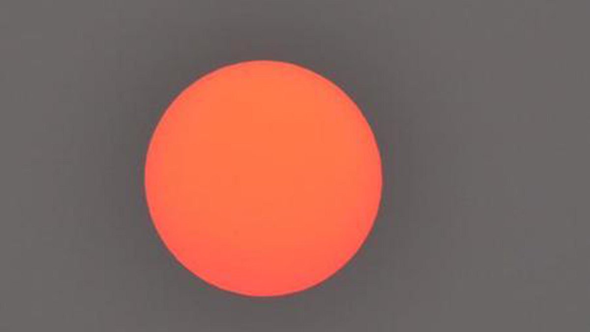 chicagotribune's tweet image. Wondering why the sun looked a little strange over the Chicago area this morning? trib.in/1IBYMU4