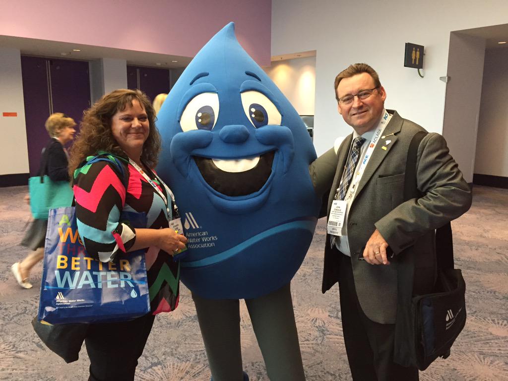 txawwa's tweet photo. Jennifer Elms, TX Section Chair and AWWA President John Donahue with AWWA Mascot 'Eddy' #AWWAACE15 http://t.co/9LrJRb1Z0Y