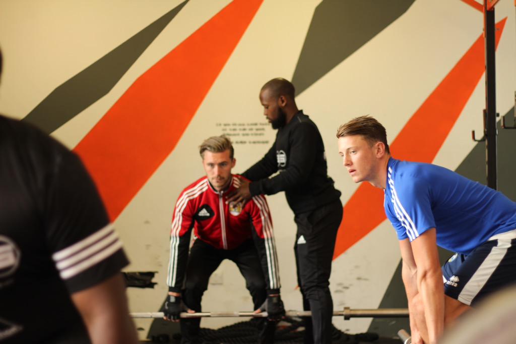 Back_2_Action's tweet photo. The man with the magic touch @RayanWilson helping @georgerigg out with his posture at day2 of #B2ASummerCamp http://t.co/VYx7B63PiV