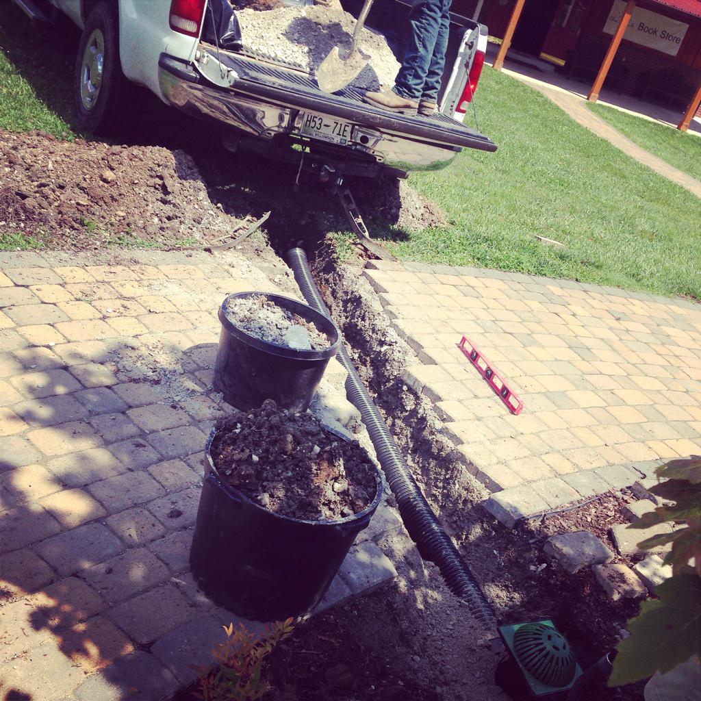 PoplarSpringsTN's tweet photo. Doing a little drainage repair today #SavingPlantsFromDrowning http://t.co/PaYJBif2Gp