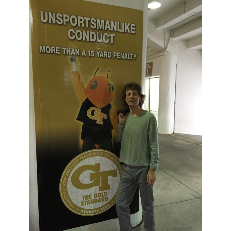 MickJagger's tweet image. Consulting with Buzz about penalties for unmusicianlike conduct!...