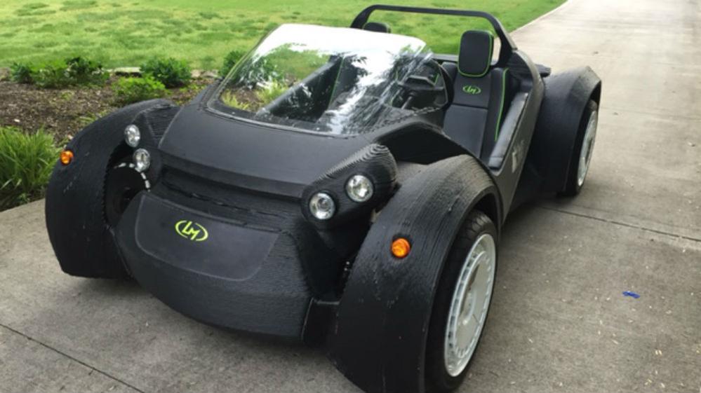 AJENews's tweet photo. "Yes, that's a car made from a printer." http://t.co/fIgMF82YDT http://t.co/oIygIT2VKM
