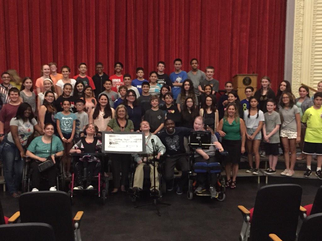 HochhauserM's tweet photo. 7th graders give check to UPC of Nassau after listening to their presentation. Fund raising for a cause @MineolaMS1 http://t.co/NqdvxXBFez