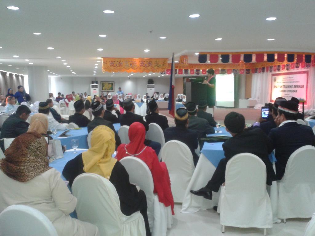 JanJanor's tweet photo. Atty. Ma. Cristina B. Layusa of Supreme Court of the Phil. Confirming our 1st Davao Shariah training Graduates. http://t.co/10nud79HsB