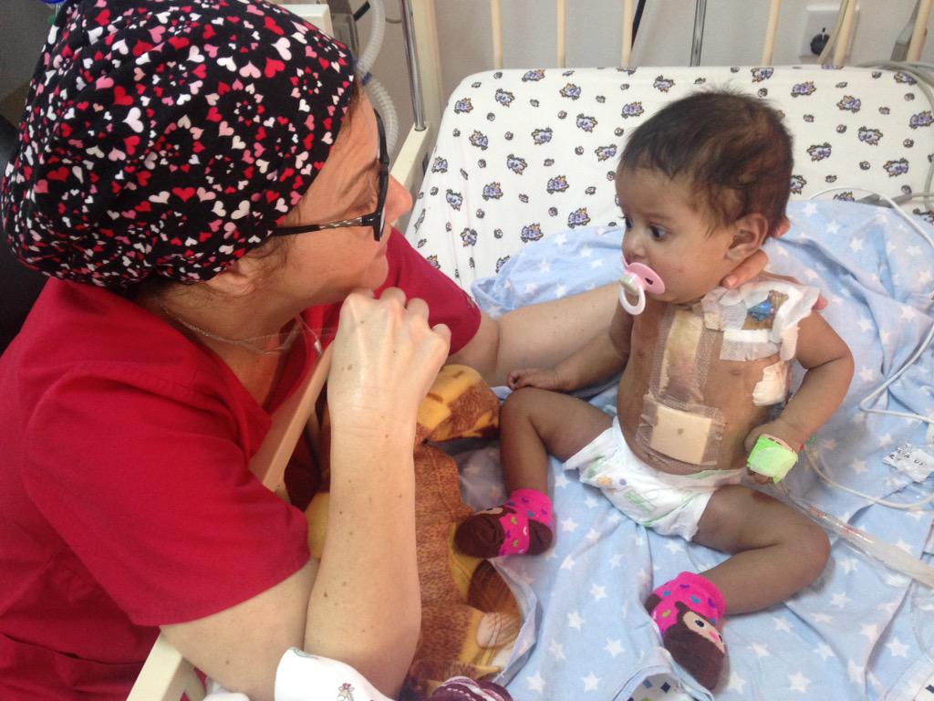 LjSauter's tweet photo. "Tell me more!" Little Ayat and Nurse Karen have a binding moment! #LibbyInLibya #cardiacalliance http://t.co/lDiTiEn05J