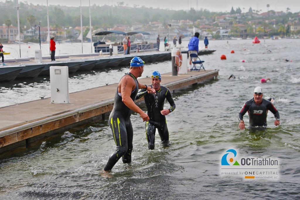 rokasports's tweet photo. Jake Ford of @SurfCityCyclery TT &amp; Mat Paz of @ProEcoTriTeam leading out #octri even time for a fist bump #findfaster http://t.co/mr9fXEKHpM