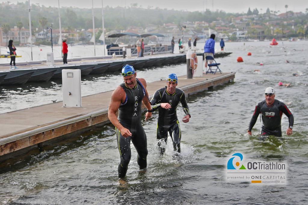 rokasports's tweet photo. Jake Ford of @SurfCityCyclery TT &amp; Mat Paz of @ProEcoTriTeam leading out #octri even time for a fist bump #findfaster http://t.co/mr9fXEKHpM