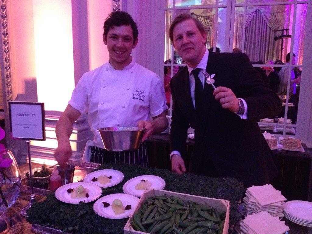 Palm Court team serving halibut and lobster jelly with a pea salad #langham150