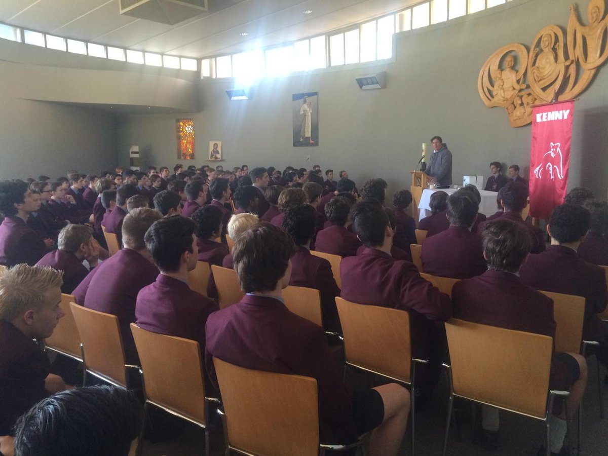 Kenny are listening to their House Coordinator Mr Atley discussing the value of generosity within the House.