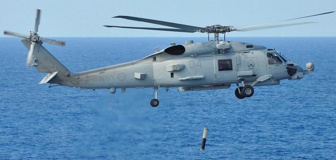 LockheedMartin's tweet photo. The @Australian_Navy officially welcomes its MH-60R helos and new training squadron. http://t.co/tU14he5zyq http://t.co/aWVtNp23Cq