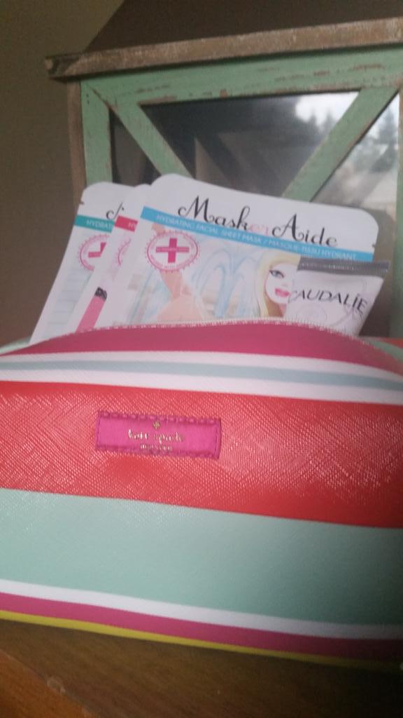 Win4Skin's tweet image. Kate spade make-up bag with assorted products donated by @thirdandclover  - bid on it this weekend !