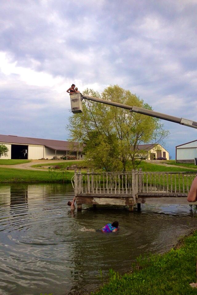 devyx3's tweet image. Who needs a pool when you have a bucket truck &amp;amp; a pond? #farm #family