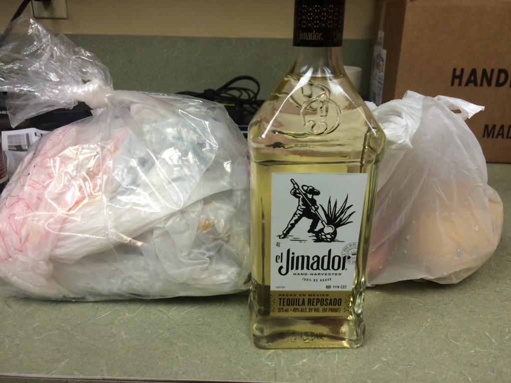 from_perdition's tweet photo. Gifts from a late night guest. Best tip ever? I think so. #mangos #tamales #tequila http://t.co/Kglsp8Esgp