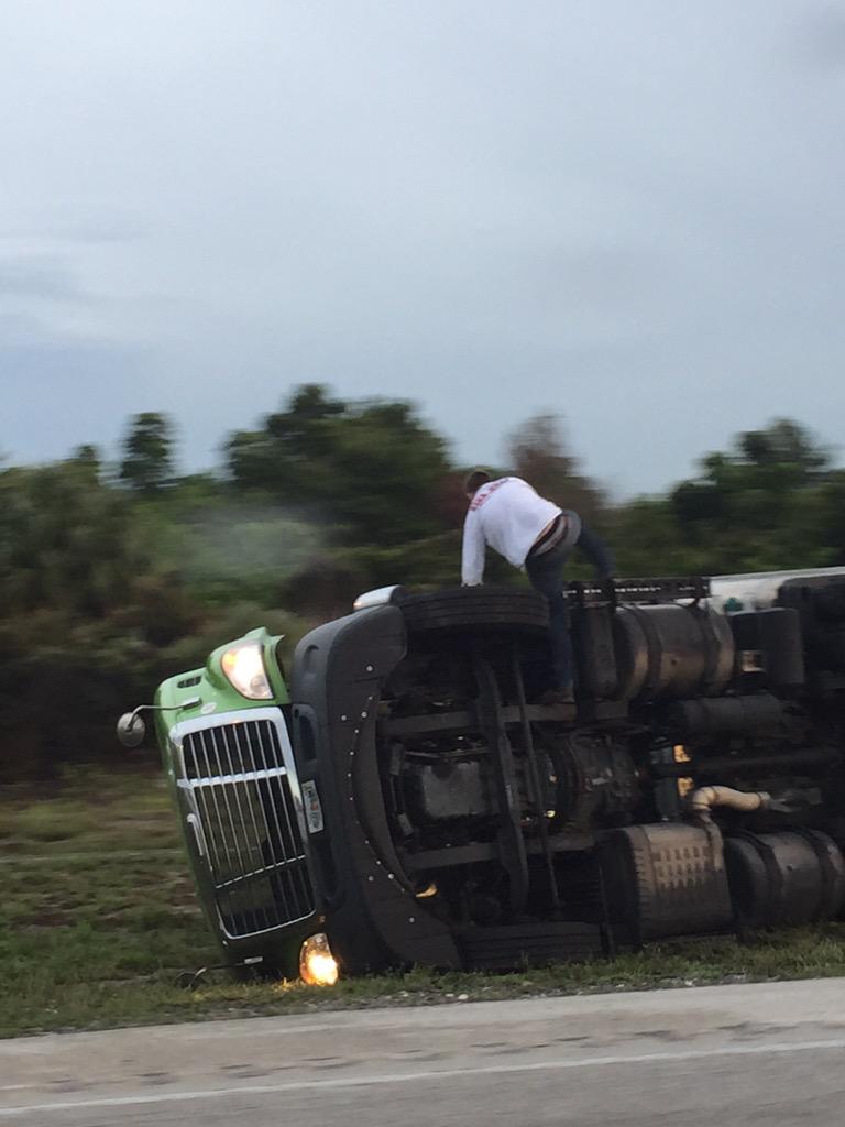 gmdempsey's tweet photo. Glades and 95 publix truck guy trapped inside http://t.co/wXReRaxjoR