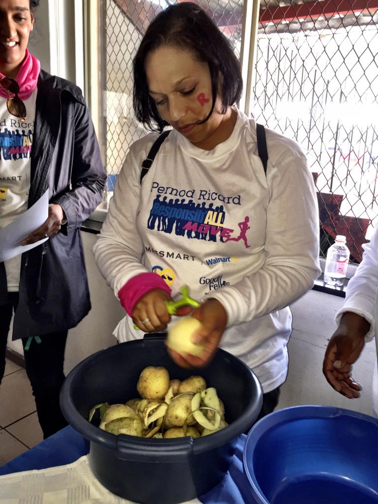 Janine from <a href="/PernodRicard_ZA/">Pernod Ricard ZA</a> helping make dinner for the people at the Haven as part of #ResponsibAllDay activities