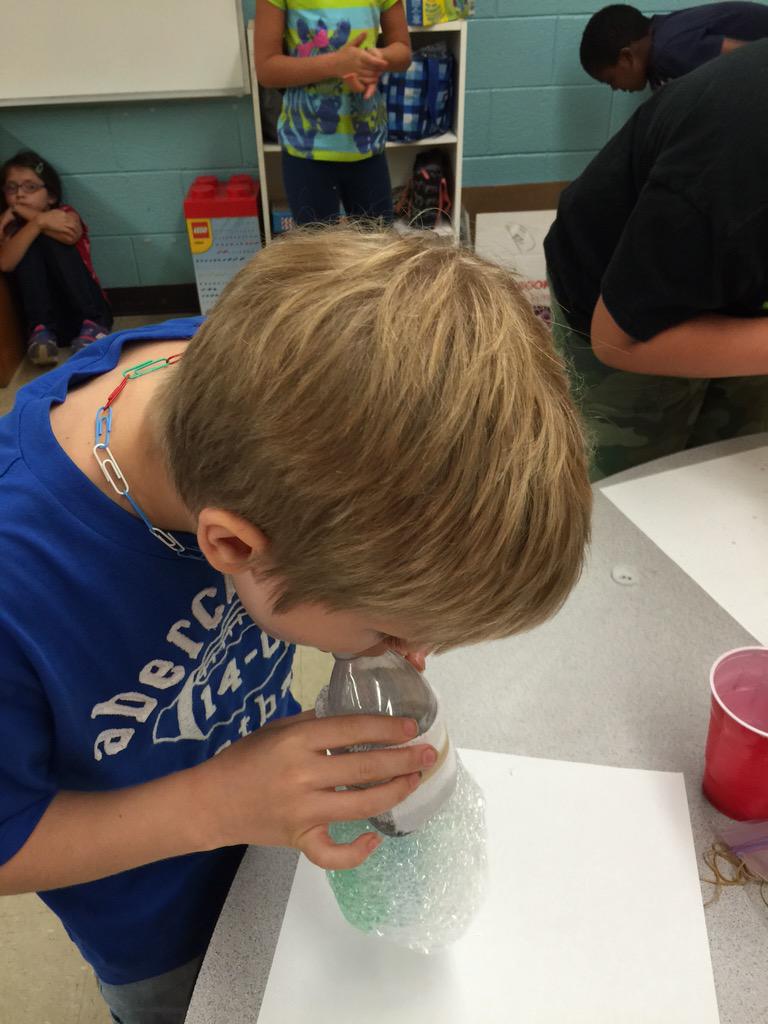 MKellhofer's tweet photo. Who says second graders are afraid of snakes? Not bubble snakes! @RockfishTigers #RFES #rocktified http://t.co/vrgx1ld6C1