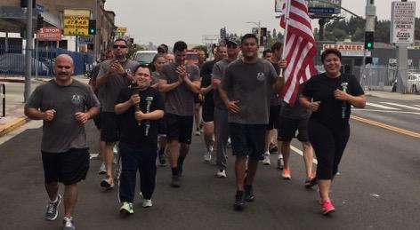 Northeast cops and friends finish strong in the Special Olympics Torch Run.