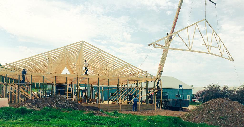 Last rafter going up on the new calf barn!