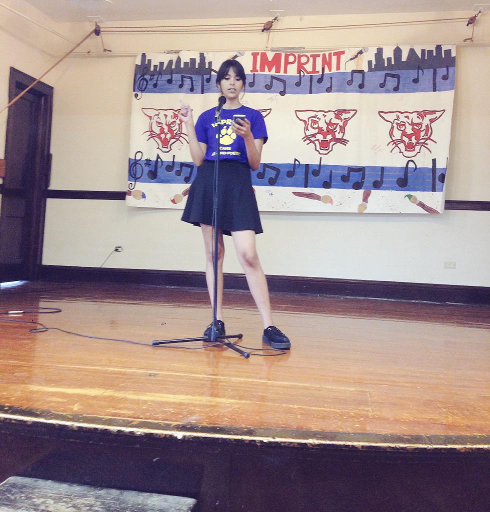 ArtDeptB52's tweet image. Lisandra Perez working the mic @ChiAcadHS #imprint2015 #poetry