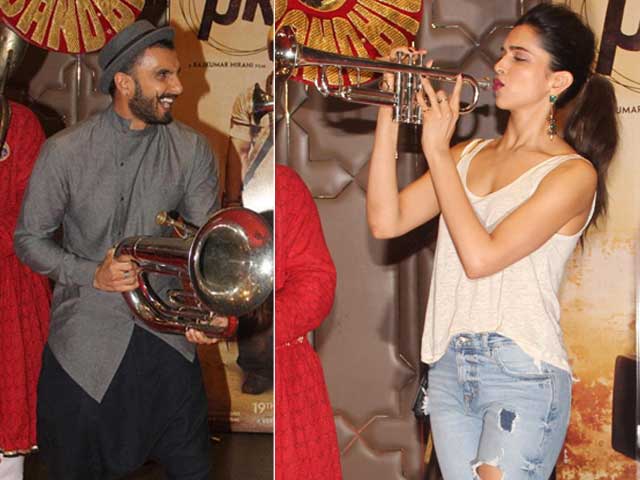 CircleofCinema's tweet photo. At Aamir Khan's Party, Deepika and Ranveer Blow PK Trumpets http://t.co/Lo82npPkYs